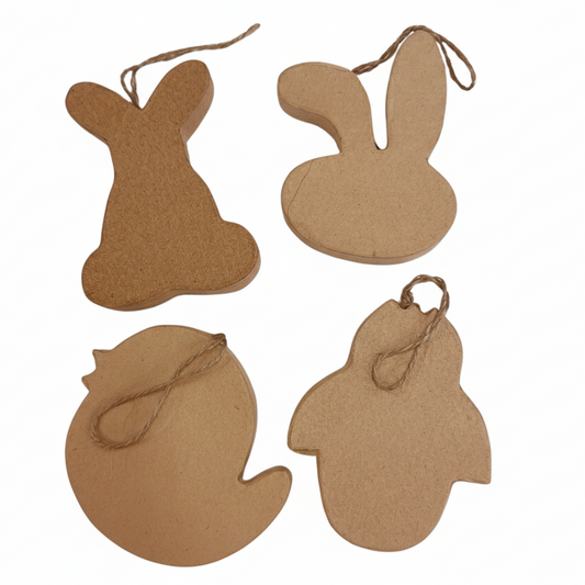 Four brown paper cutouts of animals on a white background